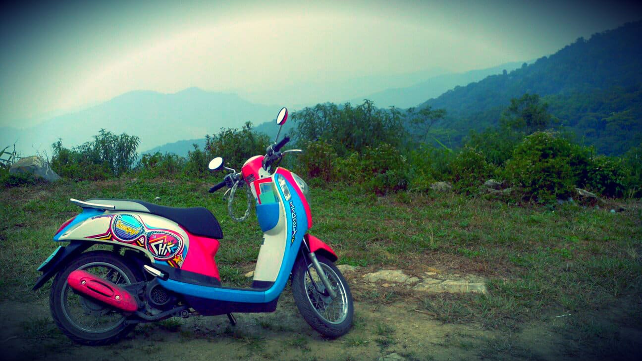 Riding a moped in Thailand