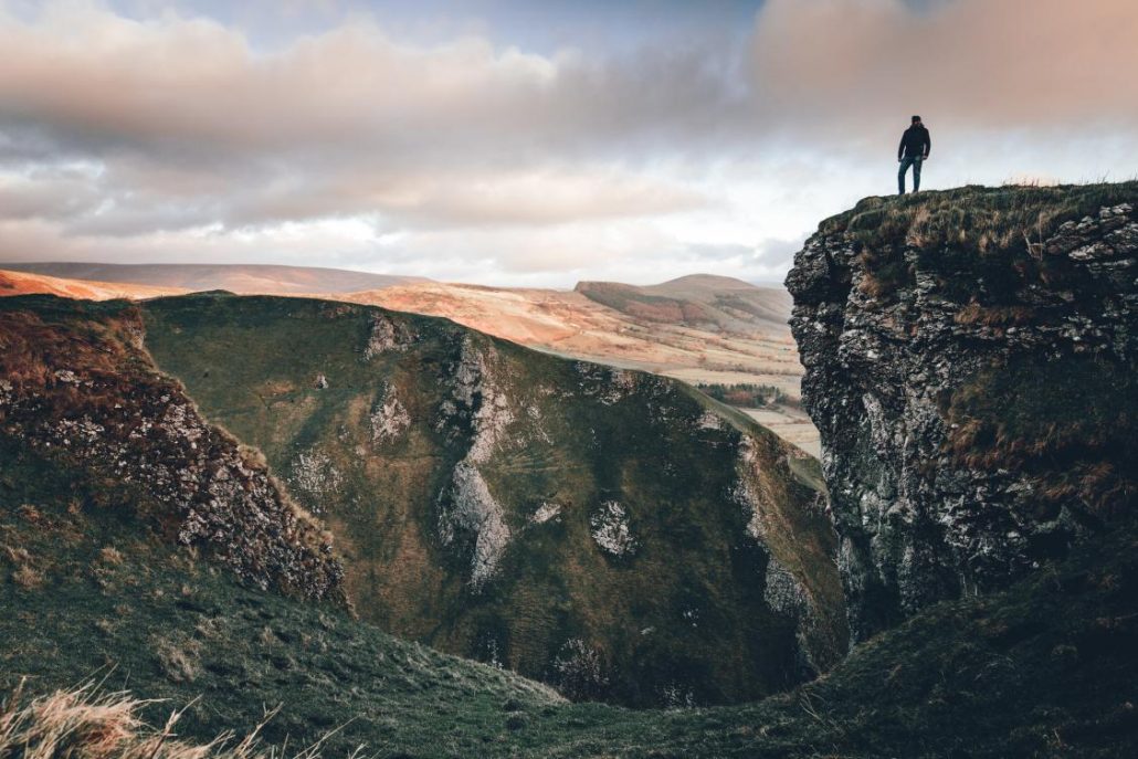 Man standing in Winnats Pass in the Peak District in Sheffield England