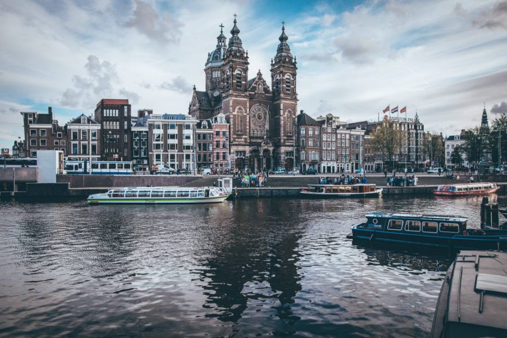 Photo of the Amsterdam Centraal Station from across the IJ