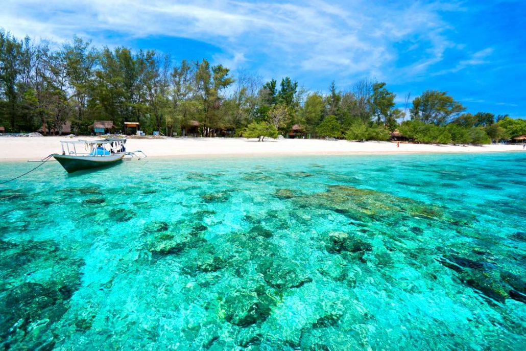 Crystal clear blue waters and golden sands on Gili Meno island in Indonesia