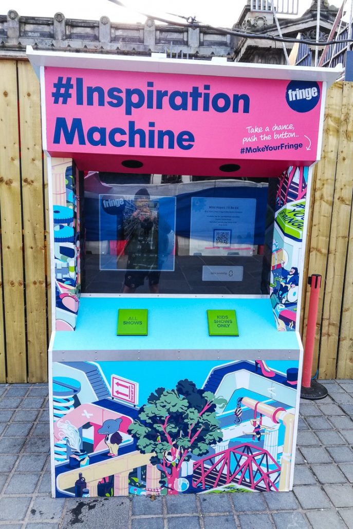 The Inspiration Machine next to the Virgin Money Half-Price Hut