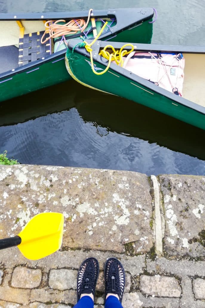 Standing on the edge of the canal with my KEEN shoes ready to go canoeing in Sheffield England